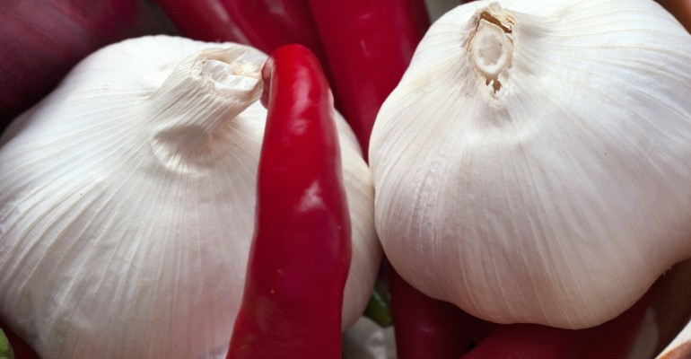 Two large bulbs of garlic and red peppers